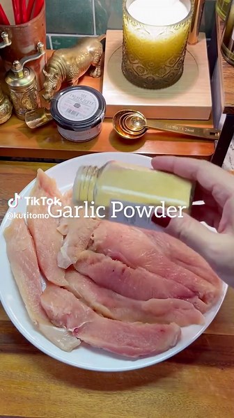 🍗🔥 Crispy Air Fryer Chicken Strips 🌶️✨ Golden, crispy chicken strips made extra crunchy with a cornflake coating and tossed in a sweet & savory garlic butter sauce. These air-fried chicken tenders are packed with flavor and crunch, perfect for an easy meal or snack! Ingredients: For the Chicken: \t•\t1.5-2 lbs chicken breast, cut into strips \t•\t1.5 tsp salt \t•\t1/2 tbsp garlic powder \t•\t1/2 tbsp Cajun seasoning \t•\tFlour (enough to coat the chicken) \t•\t1 egg, beaten \t•\t2-3 cups corn