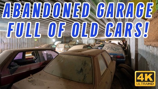Untouched abandoned garage filled with vintage cars