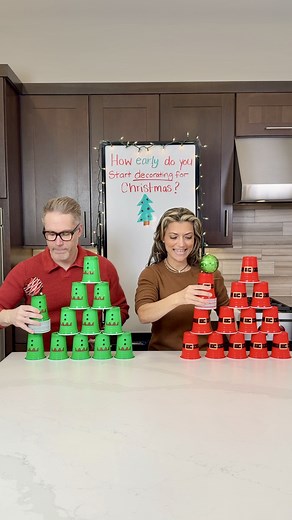 399K views · 1.9K reactions | Balance it, Stack it, Win! Getti and Mike play a holiday themed cup stacking game while balancing a Christmas ornament. Easy DIY game for holiday gatherings. #christmasgames #christmas2025 #cupstacking #HolidayPartyIdeas #holidaygames | The Tus House | Facebook