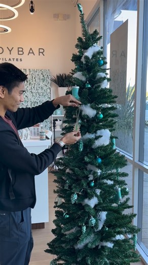 BODYBAR Huntington Beach on Instagram: "THE 12 DAYS AT THE BAR — HOLIDAY HUSTLE CHALLENGE 💪❤️ DAY 1 & 2 are LIVE! ✨ Kick off the season with some Pilates + perks: ✨ Take 5 classes within the 12 days and get entered to win a gift ✨ Before every class, add your ornament with your name to our tree for another chance to win The challenge is on NOW through the 20th — come get your holiday glow, stay consistent, and have a little festive fun along the way. 🎄🩵 Let’s hustle into the holidays together