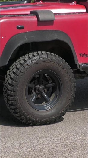 Iconic British Off-Roader: Red Land Rover Defender TD5