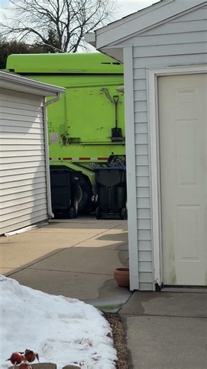 GFl Environmental’s CNG Peterbuilt 520 Labrie Expert picking up recycling.