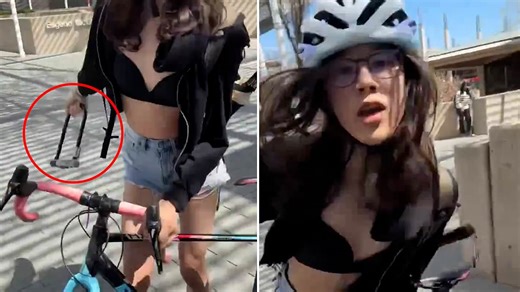 Wild moment trans activist attacks young female student with heavy BIKE LOCK