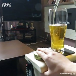 This homemade beer tap allows you to have a constant supply of beer whilst staying in the comfort of your chair 🍻 | UNILAD Tech
