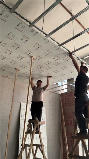 Workers installing all-aluminum honeycomb ceiling video