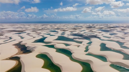 Lençóis Maranhenses sits at the intersection of three biomes—a rare overlap that supercharges biodiversity. Across 350 square miles of dunes, the rainy season brings thousands of crystal blue lagoons into view, many big enough to swim in. What makes this surreal environment possible? And why, even after 2 million years in existence, does it still feel so mysterious? Untold Earth explores the seeming impossibilities behind our planet’s strangest, most unique natural wonders. From fragile, untouch
