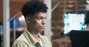 Man, coding or working on video game in office or writing a futuristic software in information technology. Developer, reading or typing on keyboard by computer screen or gaming programming at night