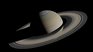 3D-rendered rotating Saturn planet with its ring against a black background