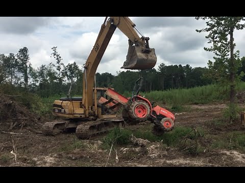 How To: Unstick A Tractor! Stuck Tractor Excavator Trackhoe Rescue