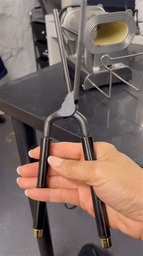 Leslie Ferrer Espinosa on Instagram: "Found a Marcel oven and iron and I wanted to test it out to see if it worked. It did!! I learned how to use this before an electric marcel curling iron! In the depths of a theater basement I learned how to curl facial hair with this. Manually heating the iron and testing it on paper to make sure I didn’t singe all the hair I just ventilated on a piece of lace. When I did go to beauty school years later to learn how to use the electric version of these irons,