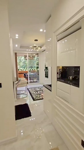 733K views · 5.9K reactions | a modern sleek kitchen with a view of a...