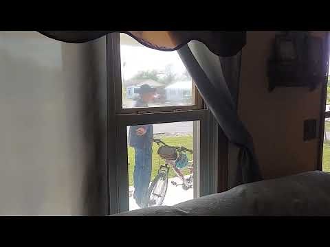 mature wife talking to neighbor braless