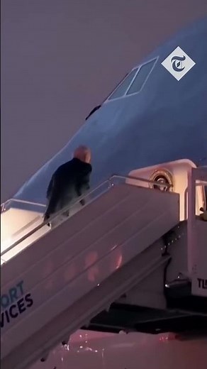 Moment US President Joe Biden trips up Air Force One stairs before leaving Poland