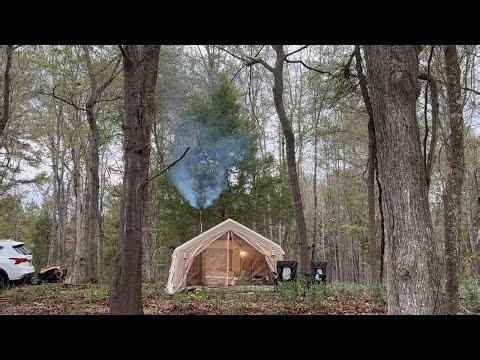 Secluded camping with lake front view in a XL tent