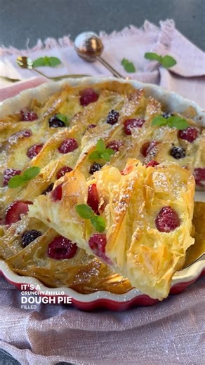 Vesela Asenova| Recipe Creator on Instagram: "Berry Soufra is a crunchy, buttery Phyllo dough pie baked with custard and berries and it simply melts in your mouth! Ingredients: 10 oz phyllo dough 7 tbs salted butter, melted 6 oz berries of choice Powder sugar, for dusting Mint leaves, for garnish Custard 3 eggs 1/2 cup sugar 1 cup milk 1/2 cup heavy whipping cream 1 tsp vanilla bean paste/extract Method: 1. Preheat oven at 400 F; 2. Brush melted butter on your baking/pie pan; brush butter in the