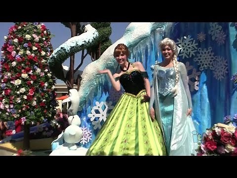 Frozen float w/ coronation dress Anna, Elsa, Olaf in Festival of Fantasy Parade at Walt Disney World