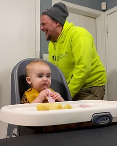 Surprisng dad with eyebrows on baby