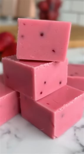 Indulge in the creamiest, melt-in-your-mouth Strawberry Fudge made with real fruit reduction and silky white chocolate! 🍓✨ 🛒 Ingredients : 3 Cups White chocolate chips 14 Ounces Sweetened condensed milk 1/4 Cup Strawberry reduction (pureed strawberries simmered until thick) 1/2 Teaspoon Strawberry extract 1 Pinch Salt 👩‍🍳 Easy Steps : 🥣 Prep the Base Combine the white chocolate chips, sweetened condensed milk, and strawberry reduction in a medium glass bowl. 🍳 Melt and Emulsify Place the b