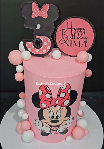 This Minnie Mouse-inspired cake turned out so cute 💕 Soft pink buttercream, sweet little details, and just the right amount of birthday magic for a 3rd celebration. . . . #MinnieMouse #BirthdayCake #KidsBirthdayCake #RachaelsDesignaCake #CakeDecorating