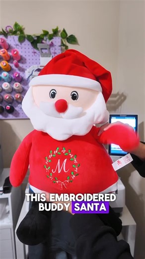Embroider Buddy on Instagram: "This squishy Santa is basically a plush marshmallow and the easiest holiday buddy to embroider. I unzip the bottom, remove all the stuffing, hoop him with my Mighty Hoop, add a topper for clean stitches, and let the machine work its magic. Then I fluff him back up and he is ready to slay the holiday season. 🎅✨ #embroiderbuddy #plushies #holidaycrafts machineembroidery embroiderylove"