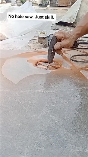 Cutting a perfect circle in ceramic tile using only a grinder. No template. No special drill bit. Just steady hands and precision. Clean results come from control and experience. #tilework #constructionlife #tiler #bluecollar #tradesman #manualwork #skilledworker #ceramictile #grinder #powertools | Ari Cheang