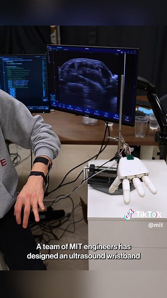 Engineers have designed a wristband that lets wearers control a robotic hand with their own movements. By moving their hands and fingers, users can direct a robot to play piano or shoot a basketball, or manipulate objects in a virtual environment. Video: Melanie Gonick/MIT News #robot #robotics #engineering