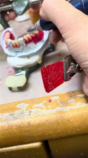 If you attach articulating paper to the fingertips of leather gloves, it becomes easier to file t...