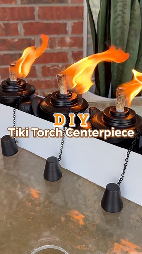 DIY TABLETOP TIKI TORCH CENTERPIECE🔥 #tikitorches #tikitorch #diycenterpieces #summercenterpiece #outdoordining #outdooreating #eatingoutside #mosquitorepellent #diysummer #summerdiy #summerideas #summerhacks | Kaitlyn Anderson