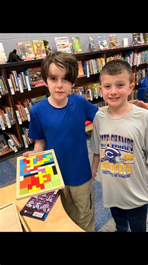 Students put their problem-solving skills to work with hands-on puzzles during library time! Smiles, teamwork, and learning made for a great day in the library. 💙📖 #SchoolLibrary #LibraryFun #LearningThroughPlay | Reading With a Wildcat - Columbia Primary School Library