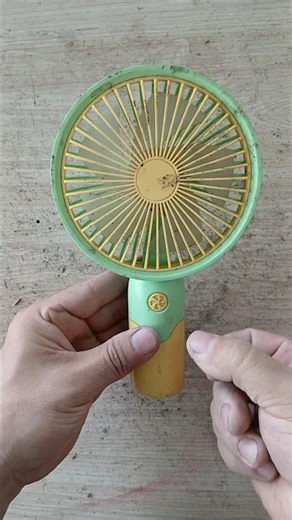 Reviving an extra-large handheld mini fan that hasn't been used for a long time.