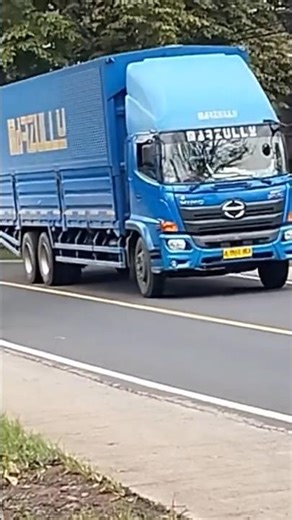 Marzuly swing container truck maneuvers across the Banen incline
