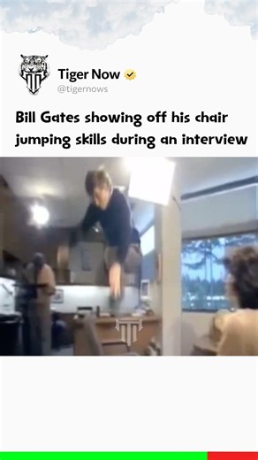 Bill Gates showing off his chair jumping skills during an interview