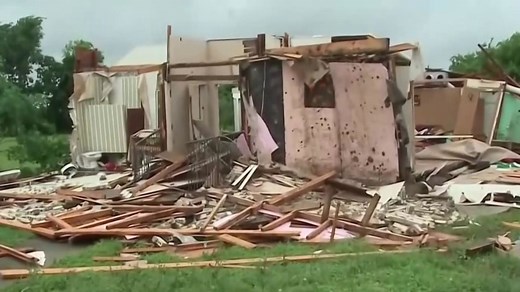 New tornado strikes Texas, flood disaster grows in Iowa
