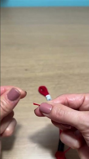 HOW TO THREAD A NEEDLE AND TIE A KNOT #shorts