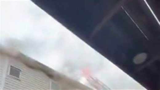 DC firefighters kept a threatening row house fire contained Sunday