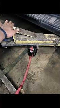 Unconventional repair procedure while replacing an Audi rear coil spring