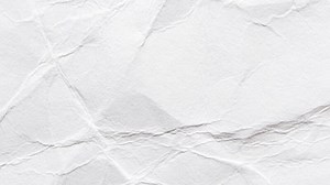 Abstract paper texture transitions highlighting smooth crease patterns in high resolution.