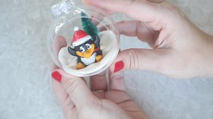 These cute penguin ornaments for kids come together in less than 5 minutes. So easy! Made with model magic dough and a penguin finger puppet.https://gluesticksblog.com/easy-penguin-ornament-for-kids-tutorial-video/ Oriental Trading Company | Gluesticks