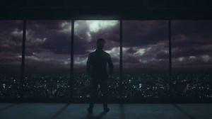 Man Looking Window Inside Tall Skyscraper At Stock Footage SBV-352315019 - Storyblocks