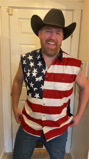 Fourth of July outfit acquired! This sleeveless American Flag Button Up shirt screams MERICA! Cody