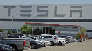 Despite coronavirus, Tesla employees required back at work: Report