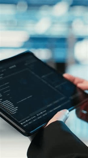 clip-4001105485-vertical-video-data-center-programmer-coding-on