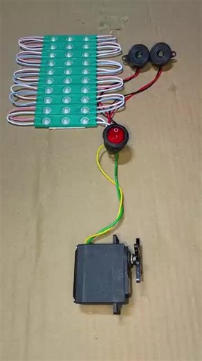 Powering Green LED Lights and Servo with DC Motors