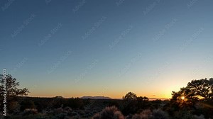 A day to night to day time-lapse in the Horseshoe Canyon Wilderness Study Area in southeast Utah. The Henry Mountains are seen in the distance.