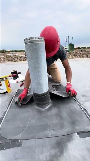 Fixing a boot pipe on a flat roof
