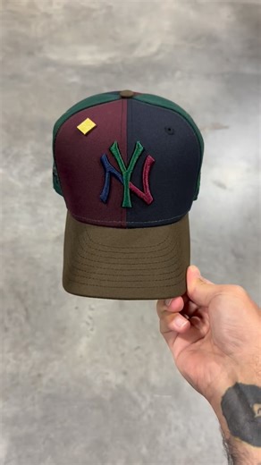 Capsule by Laced Up on Instagram: "This 1999 New York Yankees World Series hat (Restock) features a Pinwheel-panel design in navy/maroon and dark green, paired with a walnut brim for a premium vintage look. The raised tri-color “NY” logo adds a bold twist to a timeless classic, celebrating the Yankees’ dominant championship season with rich tones and championship energy. Navy/Maroon/dark green/walnut (Grey Brim) (Restock made in china) 5pm ET Exclusively on Capsulehats.com‼️🚨⏰"