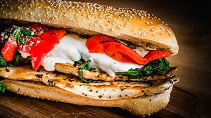 This hero is loaded with flavor and easy to make! Recipe below: . INGREDIENTS - For the sandwich - 1 pound chicken cutlets - thin sliced - 2 hero/sub/hoagie rolls - 1/2 pound plus red roasted peppers - use as many as you want - 1/4 pound fresh mozzarella - sliced - 2 cups sauteed broccoli rabe - broccoli rabe recipe linked above. - For the marinade (reserve 1/4 for topping the sandwich) - 2 teaspoons garlic paste - 3 tablespoons Pecorino Romano cheese - grated - 2 tablespoons fresh parsley - 1/2