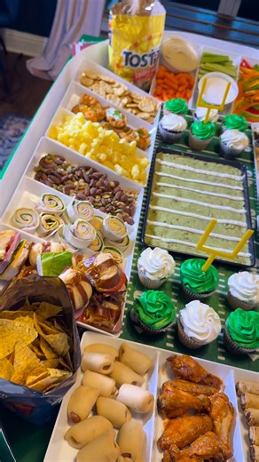 🏟️ DIY Super Bowl Snack Stadium 🏈 Because snacks deserve a stadium moment. Want to recreate this epic Super Bowl snack spread? Here’s how to make your own snack stadium using simple supplies 👇 What you’ll need: • White plastic snack containers or trays- the trays I’m using come in packs of 3, so I used 2 packs. You could also use disposable aluminum trays. • Pool noodles- from dollar tree • White duct tape • Poster board- Walmart or dollar tree • Green tablecloth • Football table runner • All
