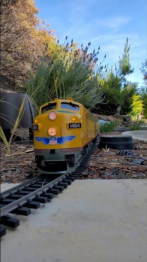 Union Pacific F7 locomotive passenger train winding through Speaker Canyon