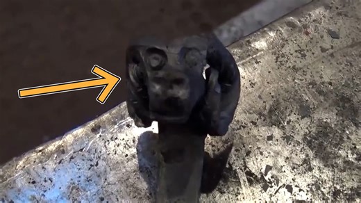Figure carving: Ram’s head hook